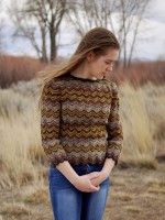 Полосатый ажурный пуловер спицами