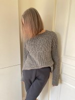 Женский пуловер с косами на круглой кокетке