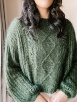 Мохеровый пуловер с косами