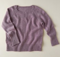 Вязаный пуловер женский