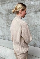 Описание вязания спицами женского свитера с рукавами реглан от дизайнера Tonje Hodne
