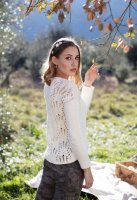 Описание вязания спицами элегантного пуловера для женщин
