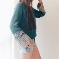 Пуловер от дизайнера Ирен Лин, связанный спицами